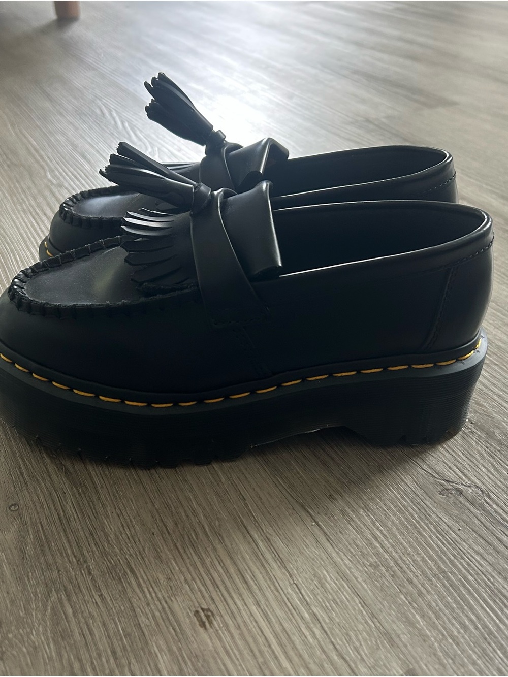 Dr. Martens Black Tassel Platform Loafers with Yellow Stitching